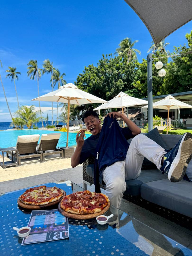 Pool side view with Onnie of the Marketing Team