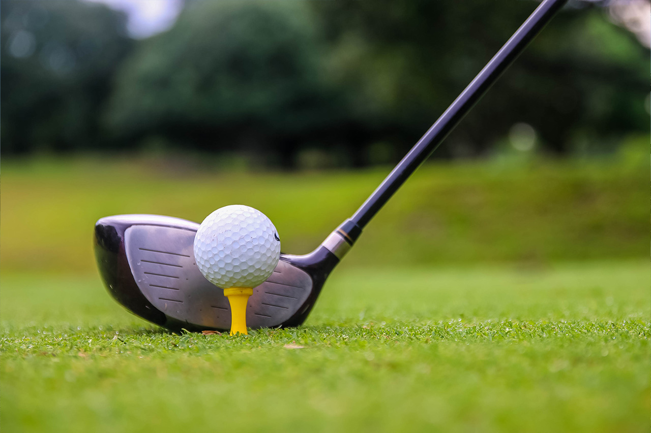 Golf ball on a tee with a driver at Bravo Golf Course in Negros Oriental