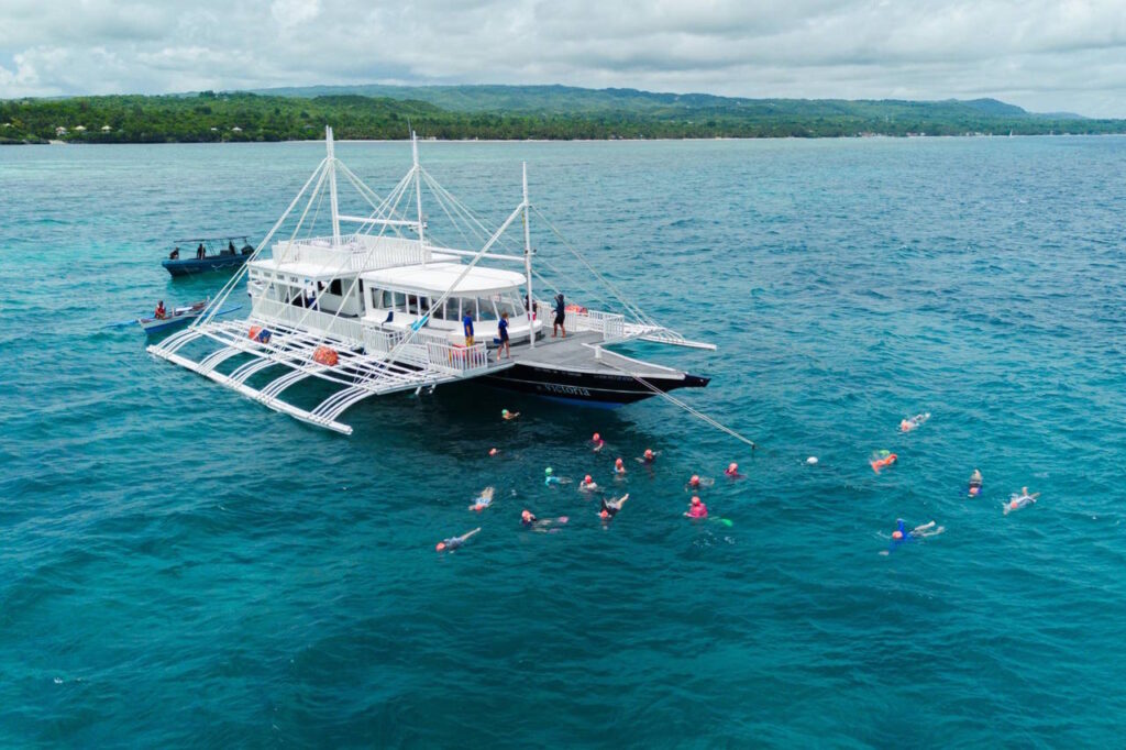 Guided boat trips to Siquijor Island swim around the circumference of Apo Island