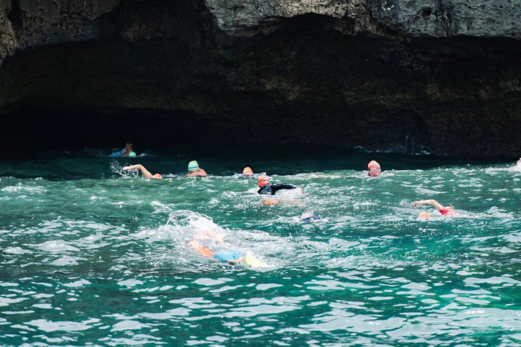 Swim around the circumference of Apo Island Swimmers from Australia