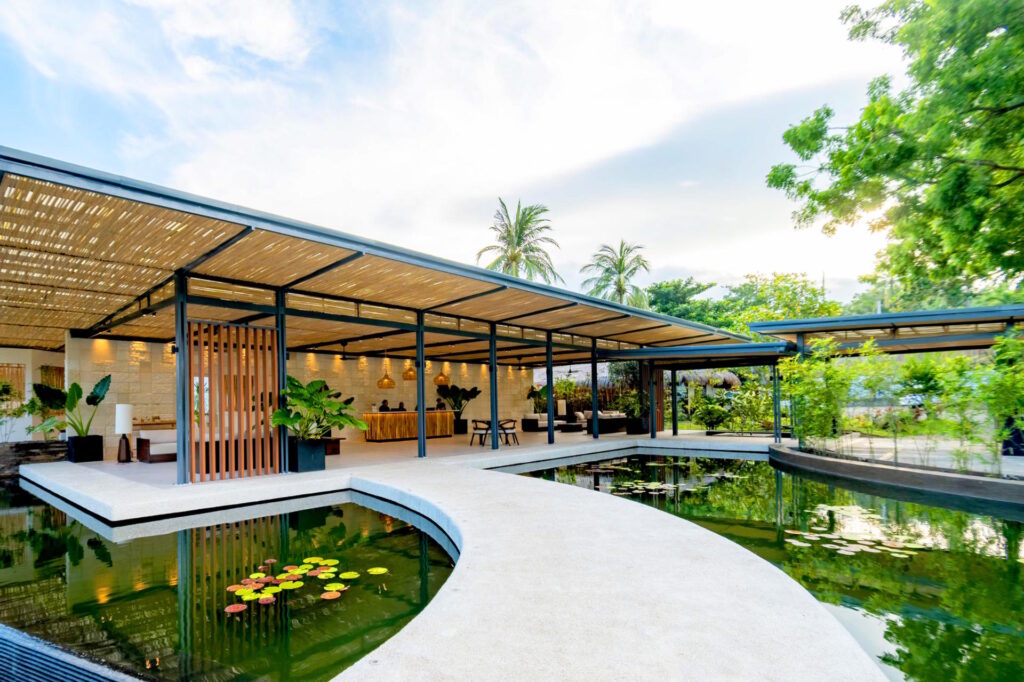 Koi pond and tropical gardens at Atmosphere Resorts & Spa in Dauin, Negros Oriental, Philippines.